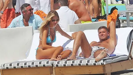 Cristian Boureanu şi iubita tinerică, show erotic pe plajă FOTO