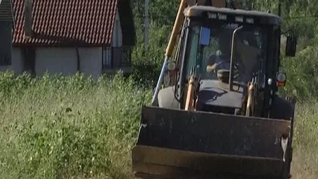 Noi percheziţii la Caracal. A fost adus un excavator pentru a săpa în curtea lui Gheorghe Dincă UPDATE