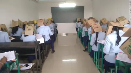 Elevi de liceu forţaţi să poarte pe cap cutii de carton ca să nu copieze la examen