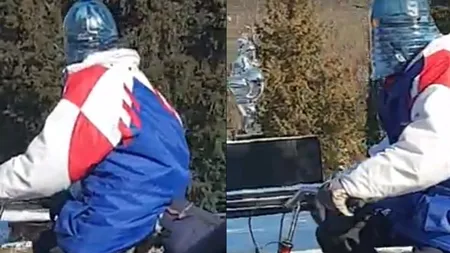 Românul este inventiv. Cum a fost fotografiat un biciclist friguros din Reşiţa. Lumea leşină de râs când îl vede VIDEO