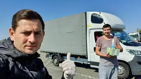 Gest impresionant în plină pandemie de coronavirus. Un român din Germania împarte şoferilor de tir mănuşi, dezinfectant şi apă