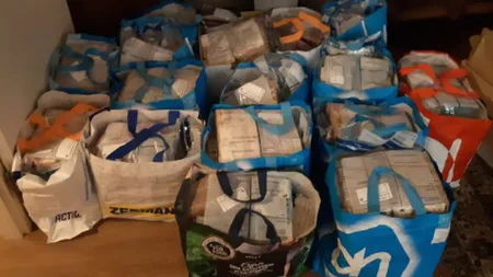 Un sfert de tonă de bani găsiţi într-un apartament. Suma uriaşă confiscată de poliţie de la infractori