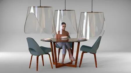 Ingenios! Un designer francez a găsit soluţia perfectă pentru respectarea măsurii de distanţare în restaurante: clopotele de plexiglas