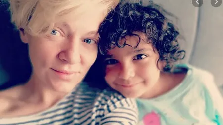 Transformarea incredibilă a fetiţei adoptate de Dana Nalbaru şi Dragoş Bucur. Cum arată acum: 