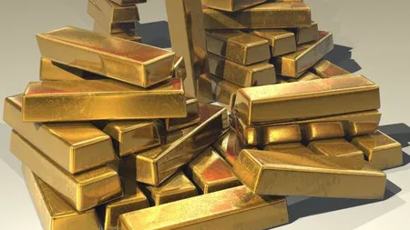 Preţul aurului a urcat la cel mai ridicat nivel din ultimii OPT ani