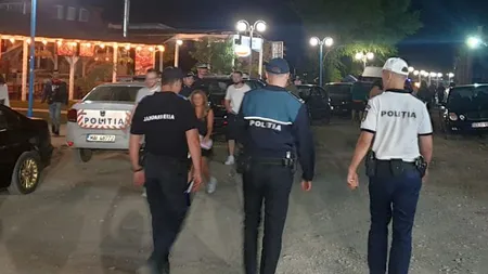 Un bărbat a fost amendat pentru că arunca cu bani în trecători