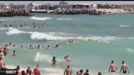 Lanţ uman pentru salvarea unui beţiv din mare VIDEO