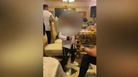 Imagini revoltătoare! Băiat de şase ani, filmat de tată cum fumează şi consumă alcool la o petrecere VIDEO