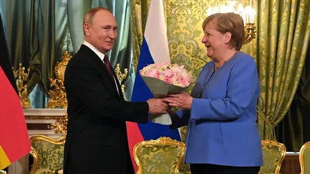 Vladimir Putin, gest de tandreţe faţă Angela Merkel, la primirea cancelarului la Kremlin. Imagini istorice de la întâlnire FOTO şi VIDEO