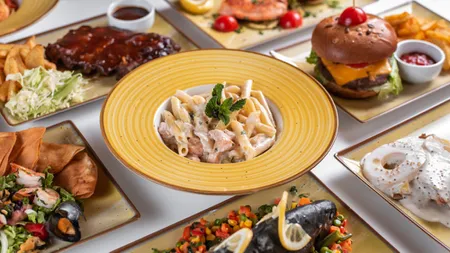 Un restaurant oferă clienților o masă gratis în fiecare zi. Ce condiție trebuie îndeplinească aceștia