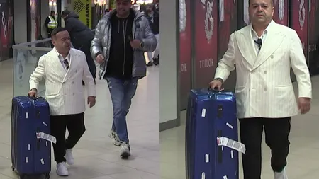 Cât de mic e Adrian Minune în realitate. Cu adidași cu talpă înaltă, este cu un sfert mai înalt decât un troller mediu: „Pentru ce ditamai valiza, când hainele ii încap într-o borsetă?