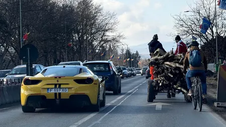 Imaginea care i-a stârnit pe români. O căruţă pare să se întreacă cu un bolid de lux pe un drum din România