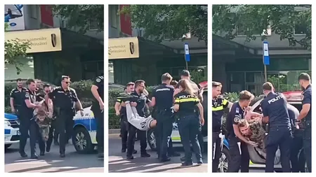 Scene halucinante în centrul Capitalei. Un bărbat a fost legat și luat pe sus de polițiști după ce și-a agresat soția