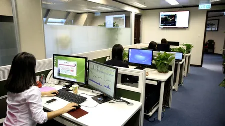 „Munca fantomă” ia amploare în China. Tinerii șomeri se prefac că au un loc de muncă și plătesc pentru a merge la birou