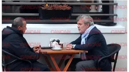 Doi ofițeri străini acoperiți, surprinși la o cafea în centrul Bucureștiului. Cine sunt bărbații misterioși