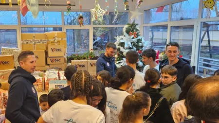 Magia Sărbătorilor 2025. Fotbaliştii de la CFR Cluj au fost Moş Crăciun pentru copiii defavorizaţi