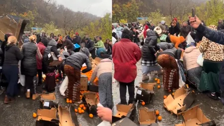 Bătaie pe portocale după ce un TIR s-a răsturnat în Mehedinți. Oamenii s-au călcat în picioare să strângă fructele de pe jos VIDEO