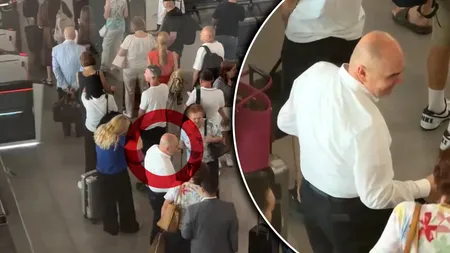 Ilie Bolojan, la coadă la îmbarcare în aeroport printre pasageri