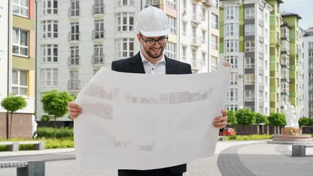 Taxă nouă pentru marii dezvoltatori imobiliari de la finalul lunii august. Banii ar putea merge la drumuri, şcoli, creşe și utilități