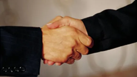 KPMG: Numarul de preluari din segmentul serviciilor va creste anul acesta