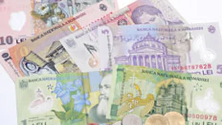 Leul confirma estimarile analistilor si se depreciaza la 3,2574 lei/euro
