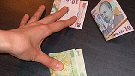 Nevoia de lichiditate ar putea intari leul in aprilie