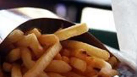 Romanii isi trateaza la fast-food depresiile provocate de criza