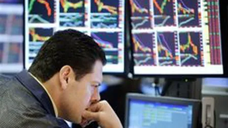 Reducerea dobanzilor cheie la Bucuresti si Budapesta a creat confuzie pe burse la New York si Londra