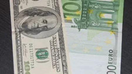 Euro s-a depreciat vineri in fata dolarului la un nou minim al ultimelor 14 luni