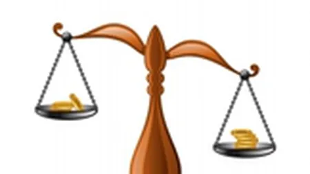 Pretul aurului a scazut cu 2%, dupa ce investitorii s-au orientat catre plasamente mai riscante