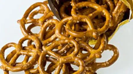 Continental Airlines le taie pasagerilor portia gratuita de covrigei pentru a economisi 2,5 mil.$