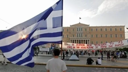 Decizia de a imprumuta Grecia, amanata de UE