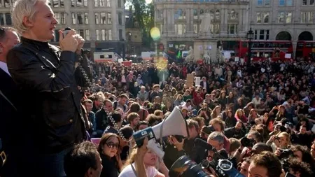 Miscarea Occupy Wall Street a ajuns si in Europa. Seful Wikileaks a condus protestele din Londra