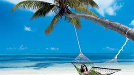 Cati romani isi permit in fiecare an vacante de peste 10.000 de euro de persoana