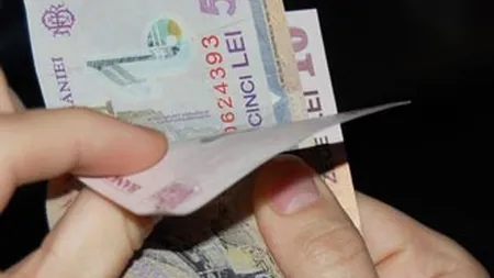 Romanii s-au indatorat mai putin si au economisit mai mult in decembrie