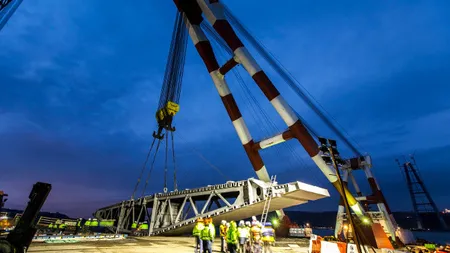 Cum arata macaraua romaneasca care construieste cel mai mare pod rutier suspendat din lume