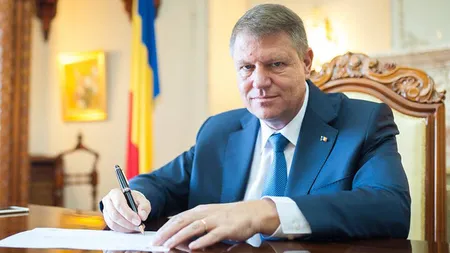 Klaus Iohannis a semnat legea! Care români primesc cinci salarii de bază minime brute pe ţară