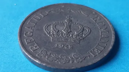 Moneda veche românească care se vinde cu o mică avere. Mulţi o pot găsi prin cutiile cu amintiri ale bunicilor