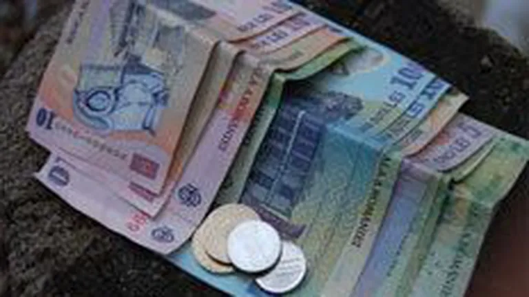 Cursul a fluctuat miercuri dimineata in jurul cotatiei de 4,28 lei/euro