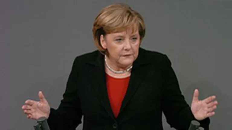 Merkel si Sarkozy discuta solutii pentru criza din zona euro