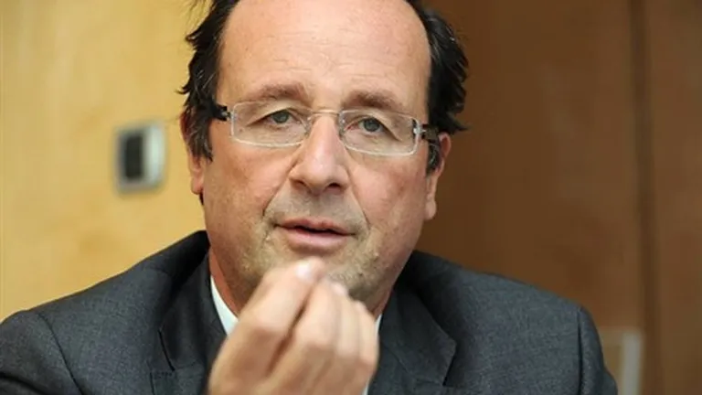 Hollande vrea sa taxeze firmele profitabile care fac concedieri