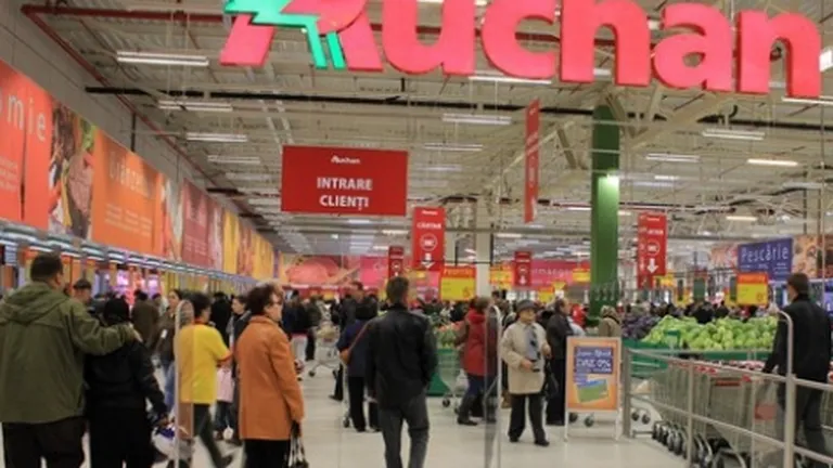 CC analizeaza preluarea Real Romania de catre Auchan