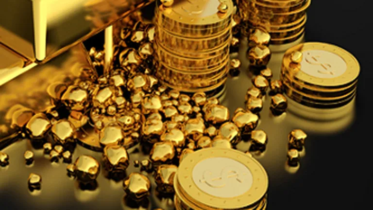 Cum a pierdut aurul aproape un sfert din valoare in 2013