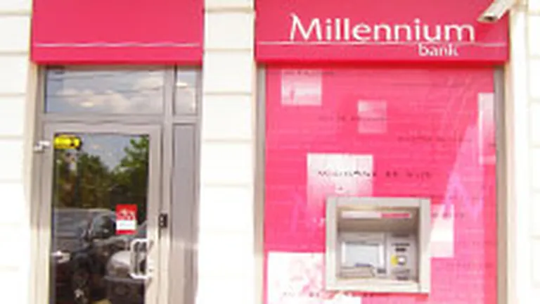 Millennium Bank si-a redus de patru ori pierderile in 2013