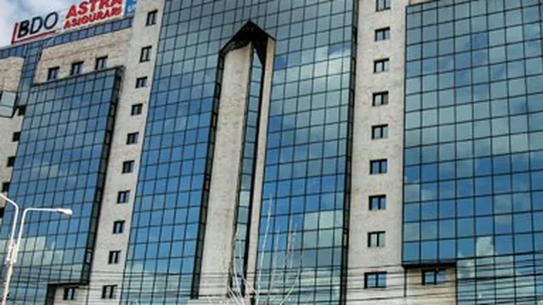 Cladirea in care au sediul Astra Asigurari si Romania Libera, scoasa la vanzare de banca
