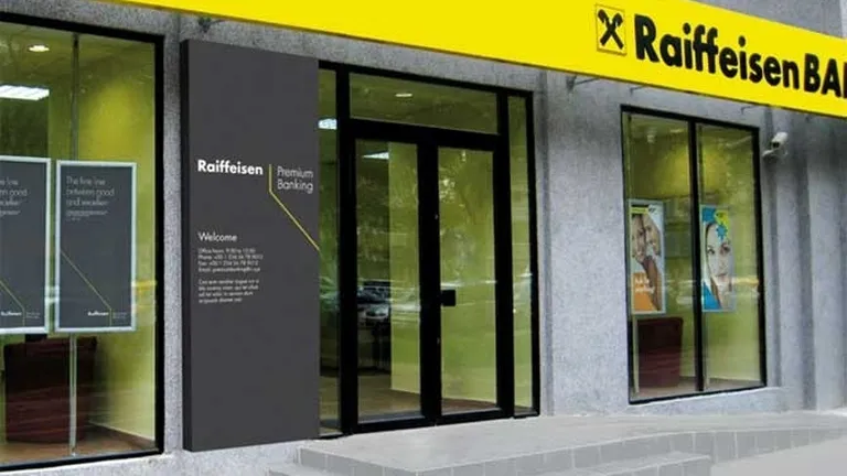Raiffeisen Bank modifica grila de comisioane pentru descurajarea operatiunilor la ghiseu