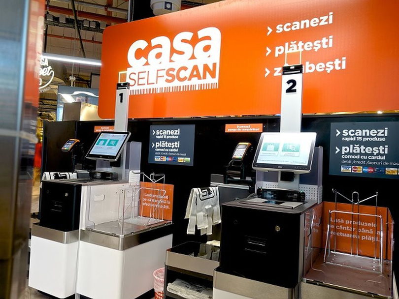 Reacții după ce Auchan a decis implementarea caselor de marcat self-scan
