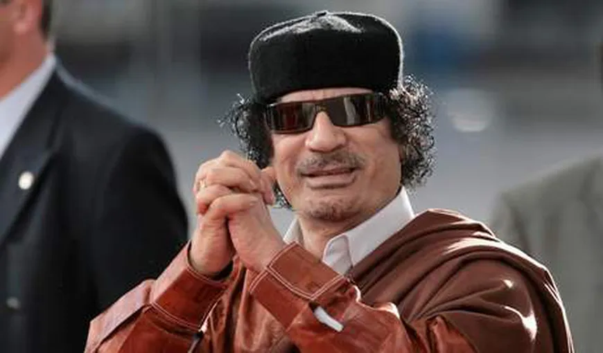 Muammar Gaddafi a fost înmormântat, marţi, în Sahara