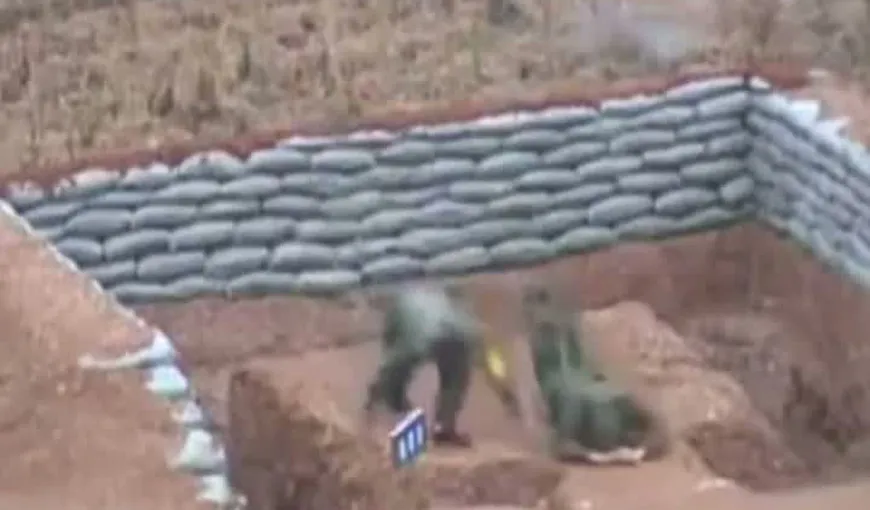 Un militar chinez, la un pas de moarte după ce a scăpat din mână o grenadă VIDEO