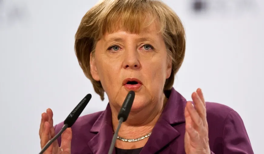 Merkel promite că va apăra euro